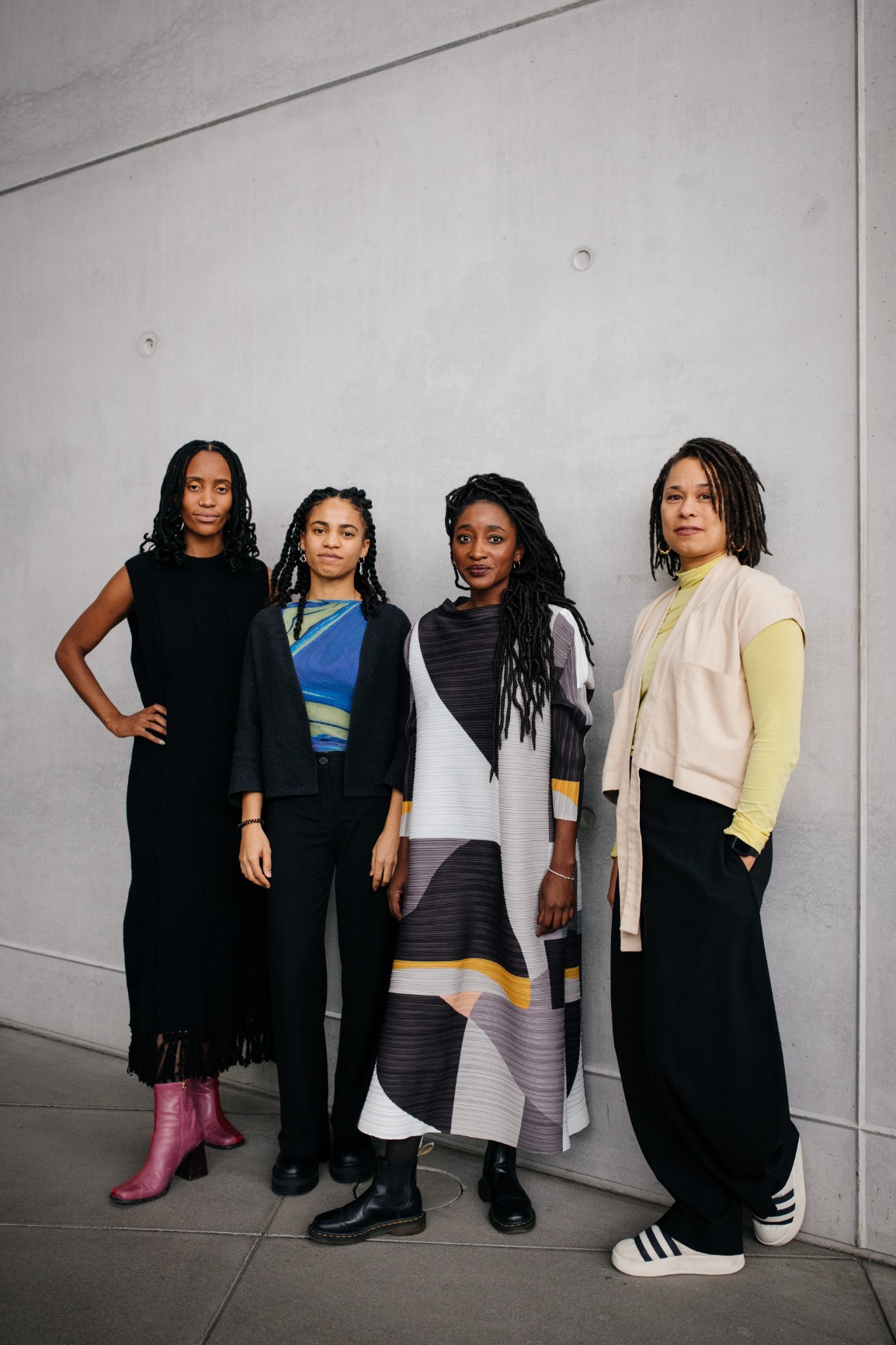 Photo of the team members including Khensani Jurzcok-de Klerk, Abdé Batchati, Margarida Waco and Afaina de Jong. All women are people of colour and smiling gently. The colours are black, brown, yellow, white, blue.